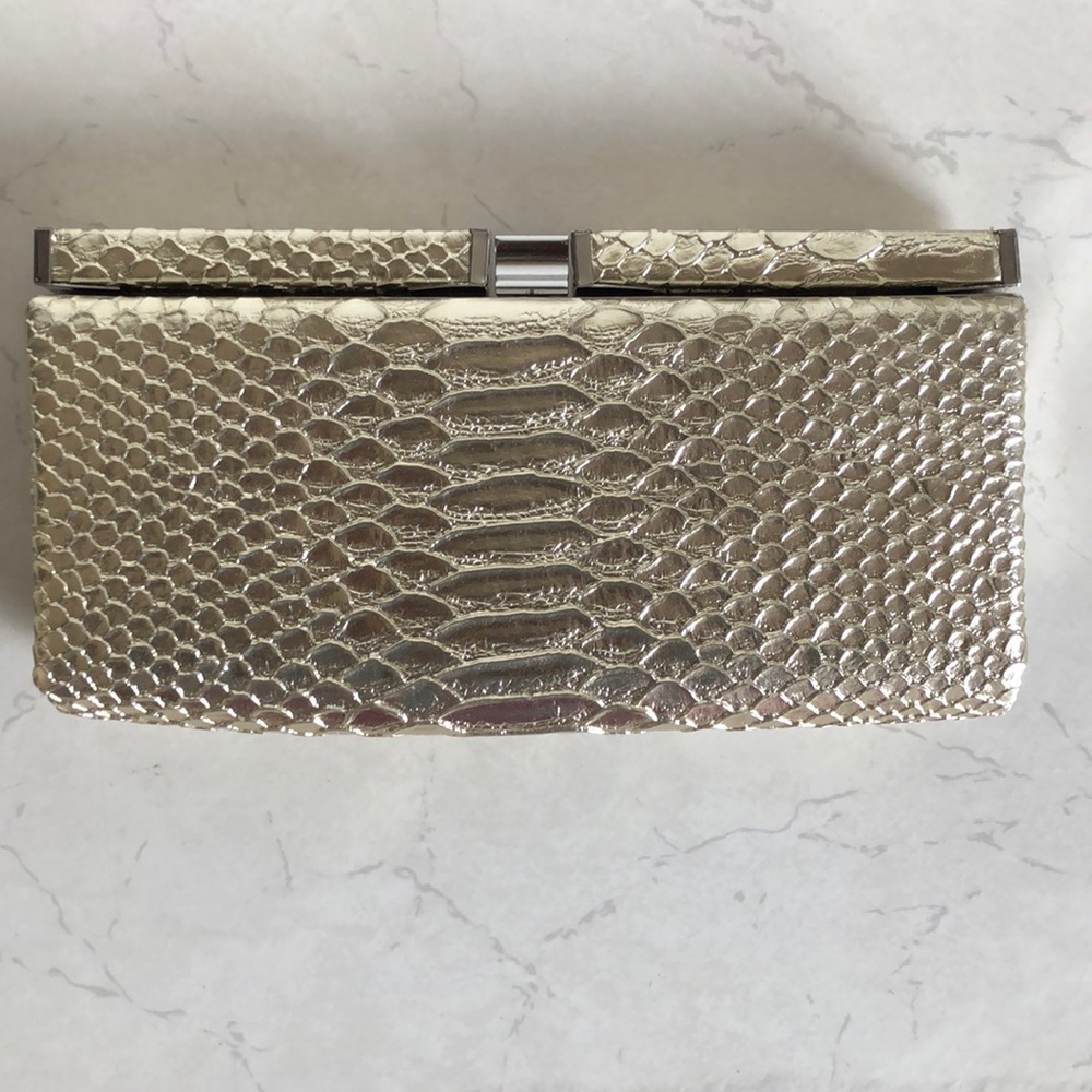 Gold clutch